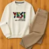 Off-White Graphic Pullover Sweatshirt and Tan Brown Jeans Set
